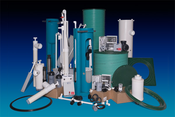Photo of various Orenco septic and general onsite products. Whether you need risers and lids, tank adapters, pump basins, effluent filters, splice boxes, or control panels, Orenco’s line of gravity & pump system products offers many advantages. 